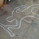 A chalk outline shows where police found "Crazy" Leo Krafchek's body.